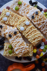 Mummy cookeis on a cookie tray.