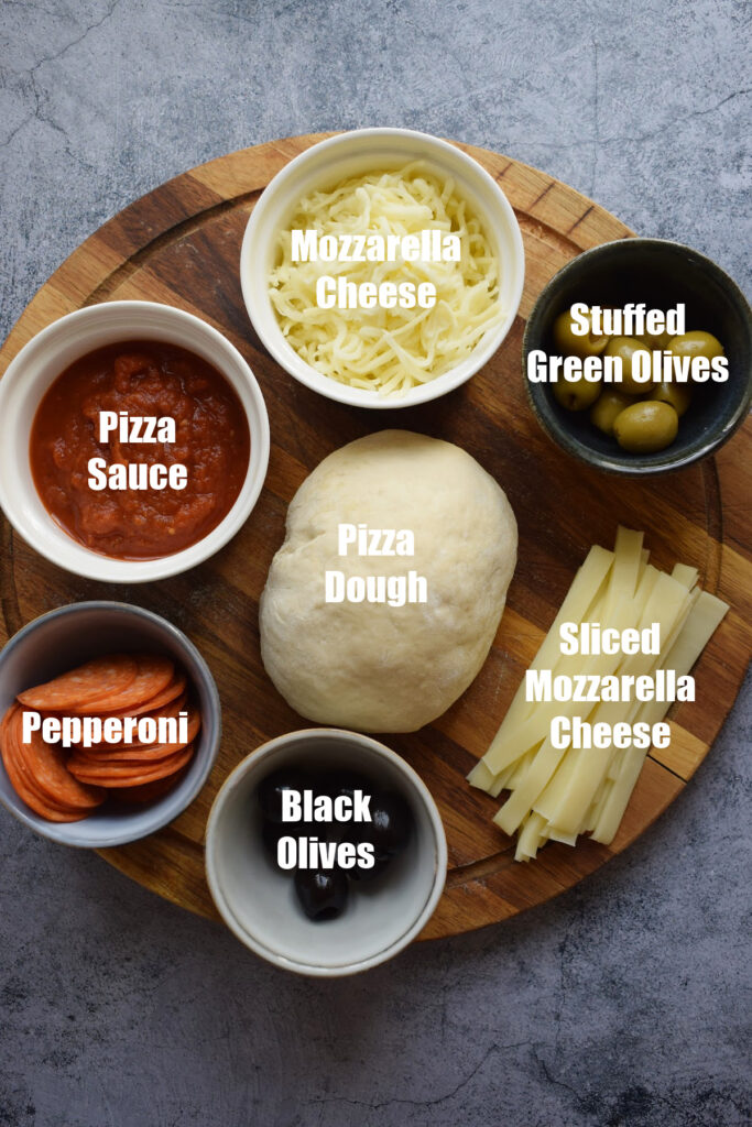 Ingredients to make Halloween Pizzas.