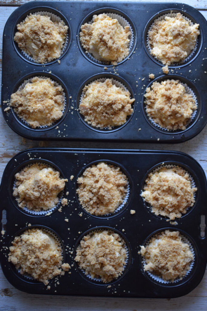 Muffins topped with streusel topping.
