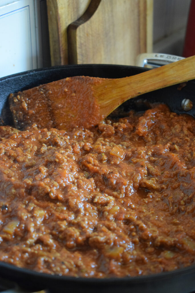 Marinara beef sauce in a skillet.