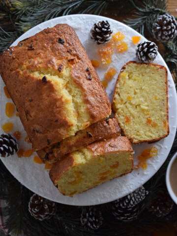 Apricot coconut loaf cake on a white plate