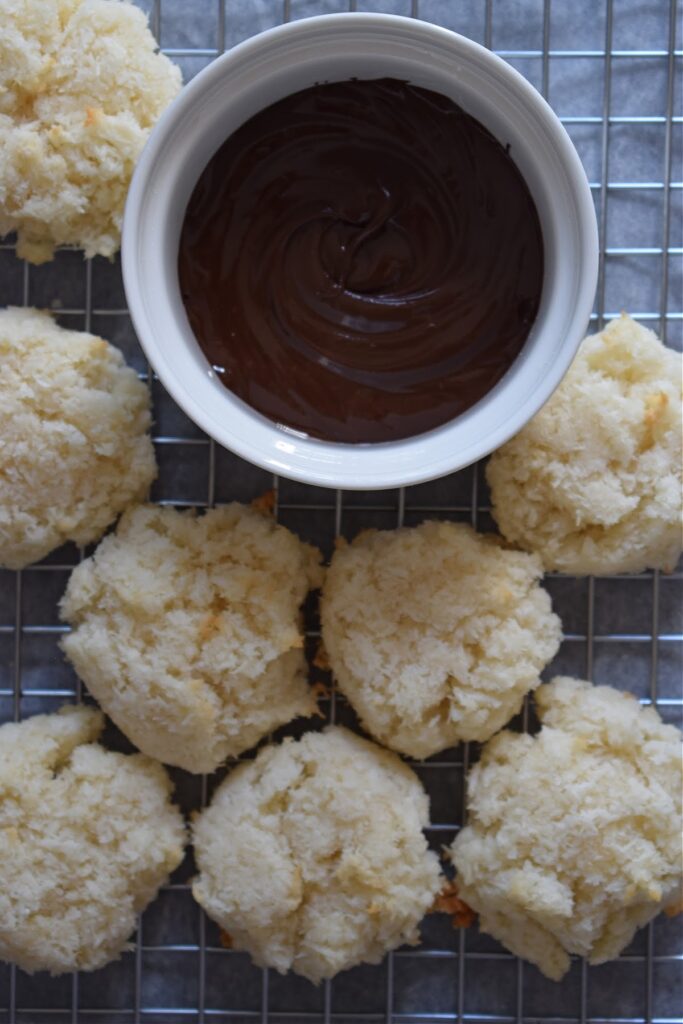 Coconut macaroons with melted chocolate.