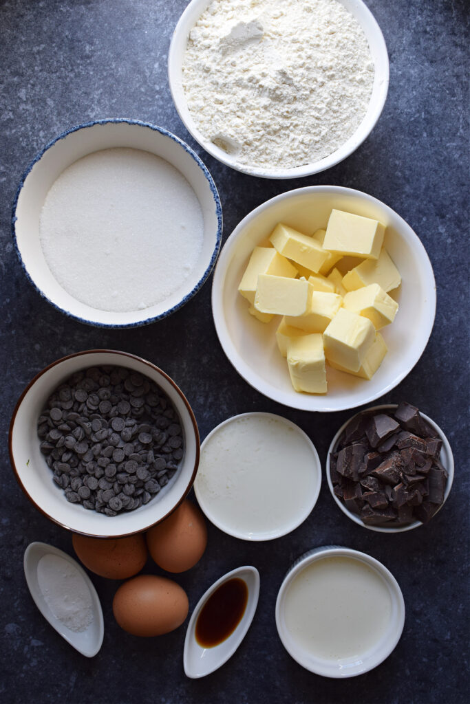 Ingredients to make a chocolate chip bundt cake with chocolate ganache.