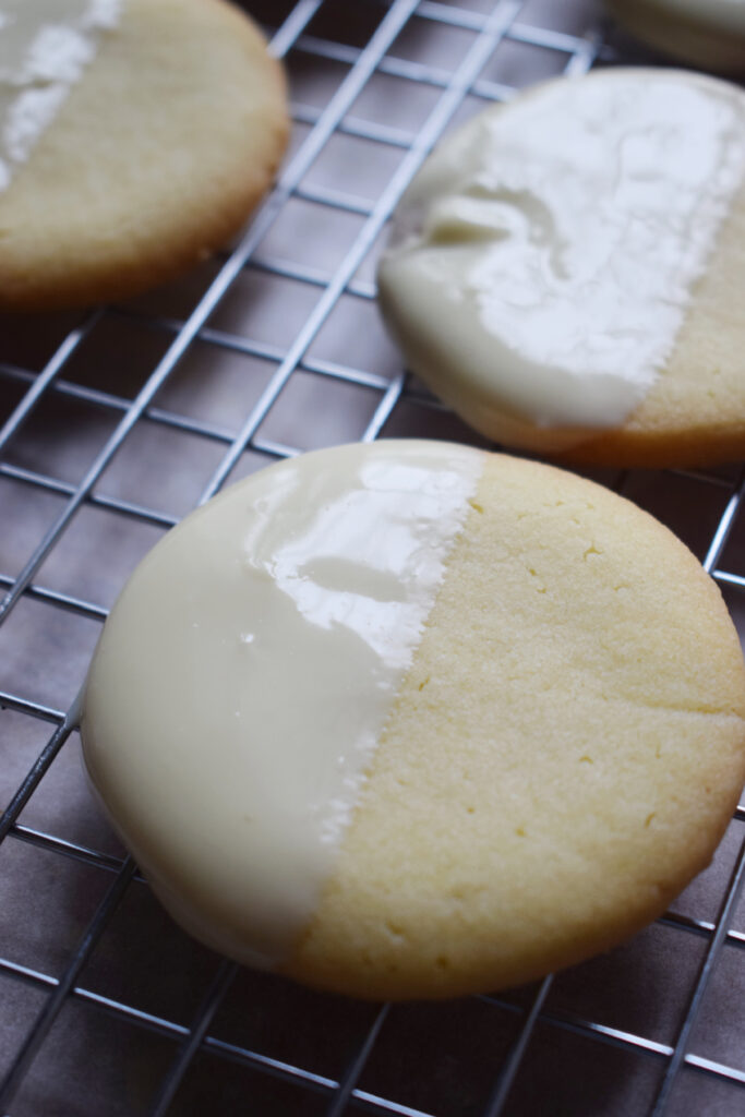 Dipped white chocolate shortbread cookies.