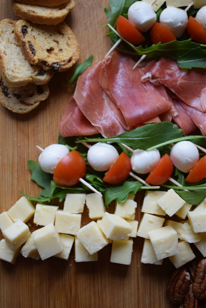 Ham, cheese and olives to make a festive holiday charcuterie board.