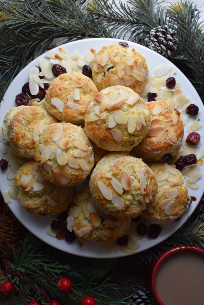 Cranberry scones on a white plate.