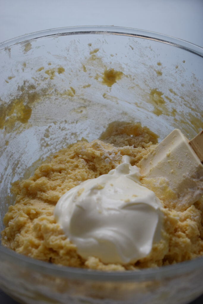 Add yogurt to muffin batter.