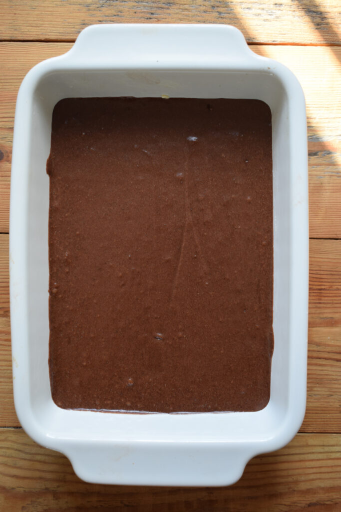 Making a chocolate pudding cake.