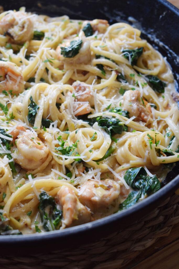 Close up of the creamy pasta dish with shrimp.