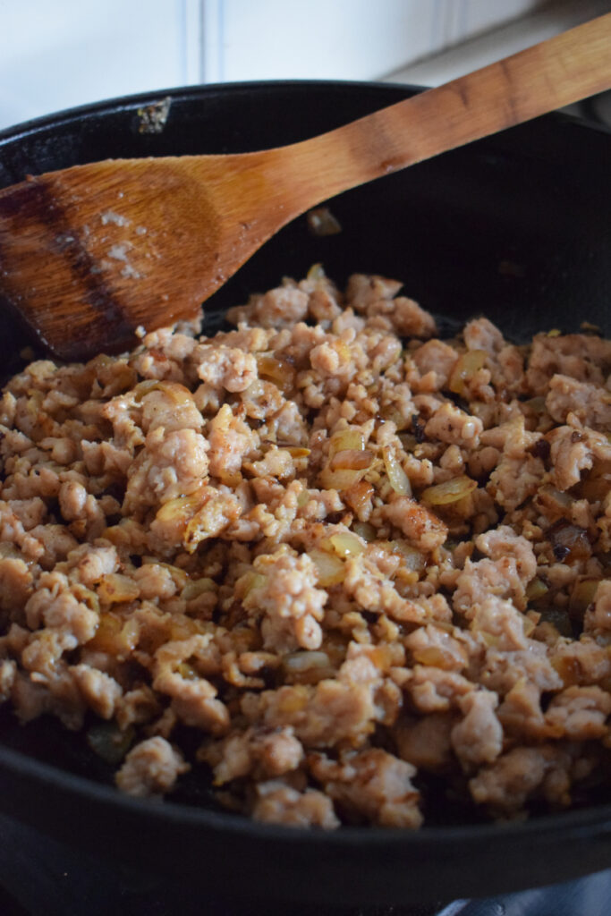 Cooked ground turkey in a skillet.