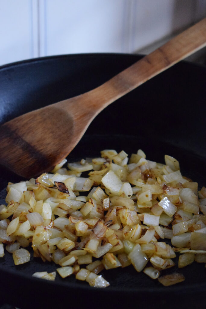 Cooked onions in a skillet.