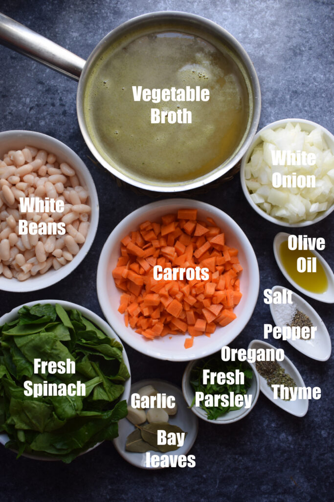 Ingredients to make white bean and spinach soup.