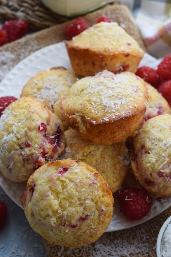 Raspberry muffins on a plate.