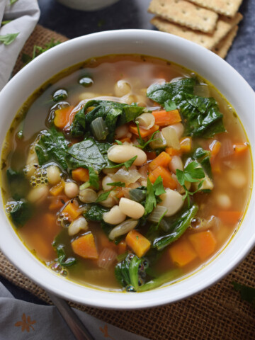 Close up of white bean and spinach soup.
