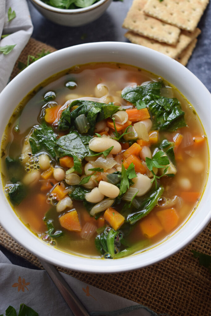 Close up of white bean and spinach soup.