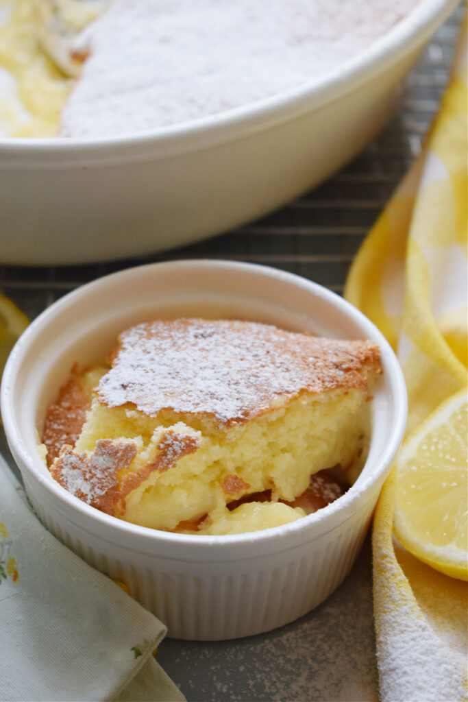 Close up of baked lemon pudding in a bowl.