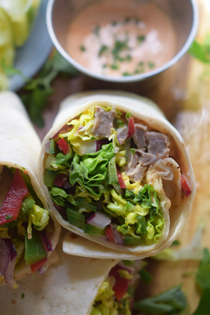 Close up of beef and vegetable wraps.