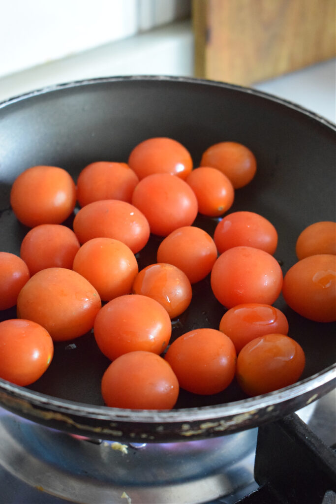 Cherry tomatoes in a medium skillet.