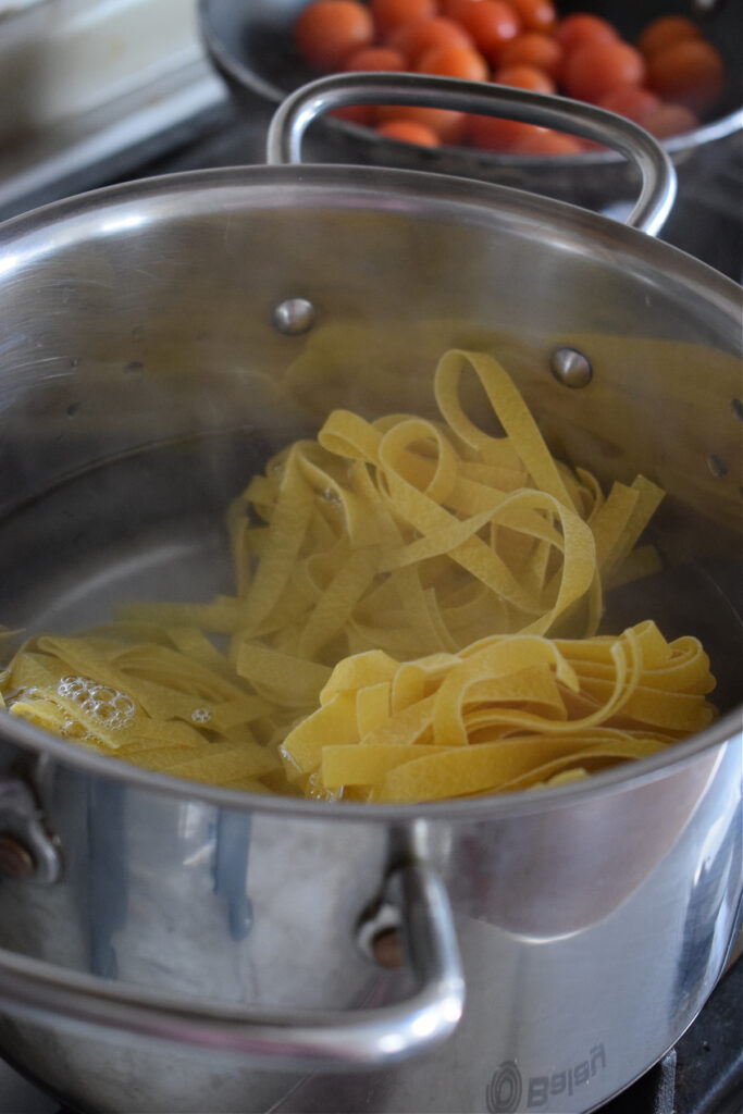 Cooking pasta on the stovetop.