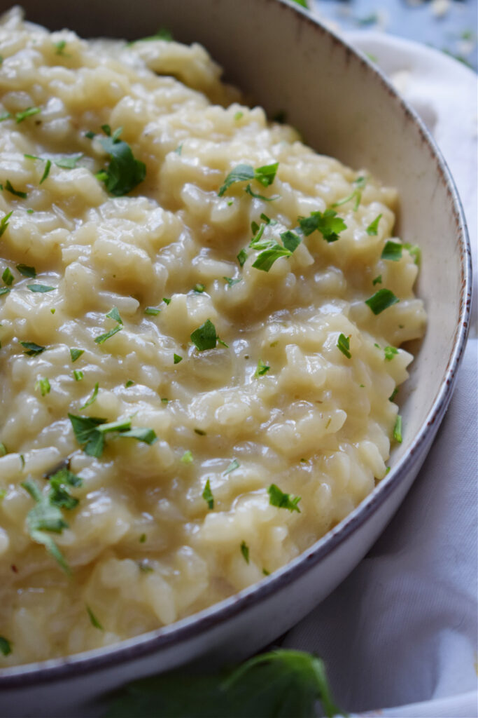 Close up of creamy risotto in a bowl.