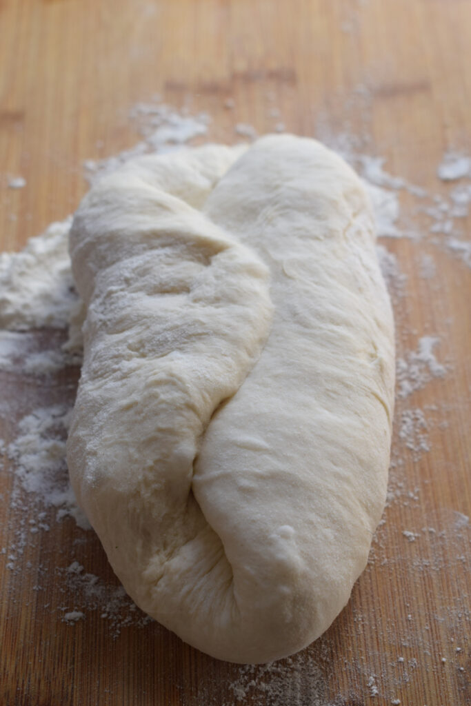 Folding dough.