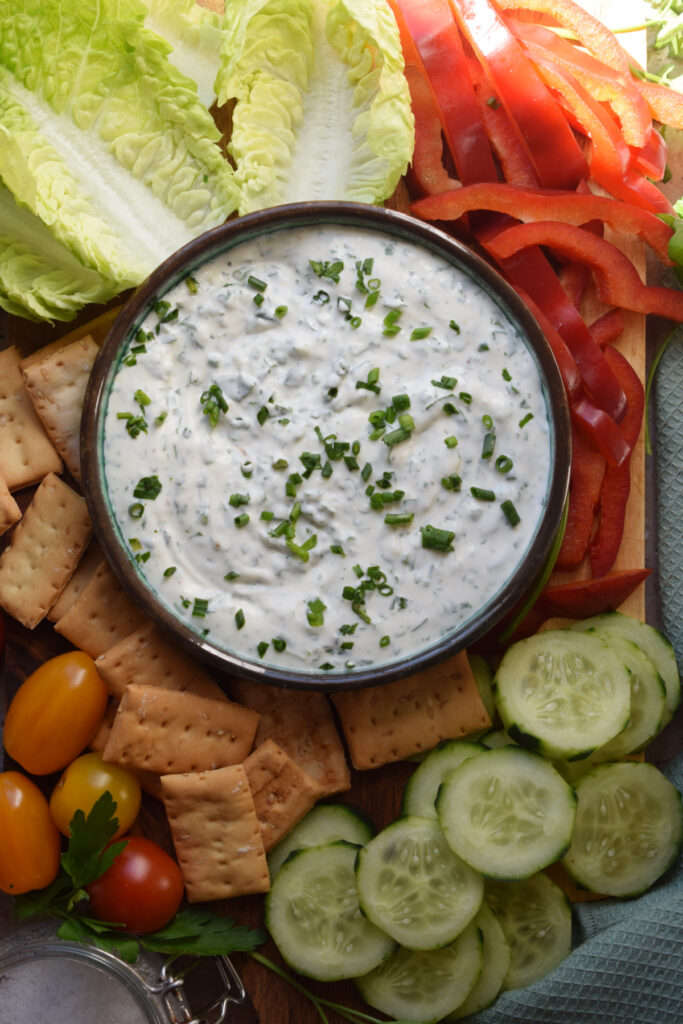 Creamy homemade ranch dip with a vegetable platter.