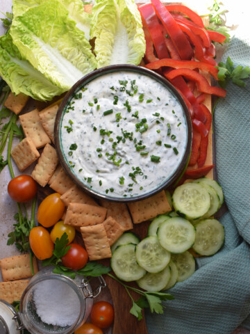 Vegetable platter with a homemade dip in a bowl.