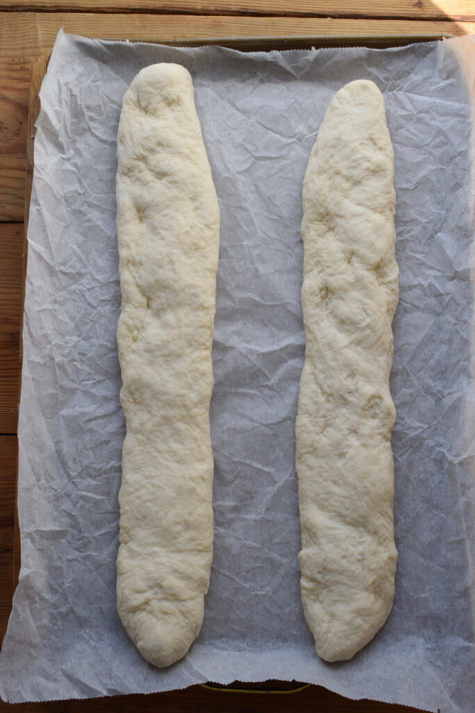 Shaped baguettes ready to rise.