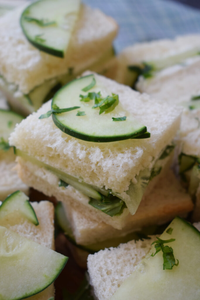 A stack of mini cucumber sandwiches.