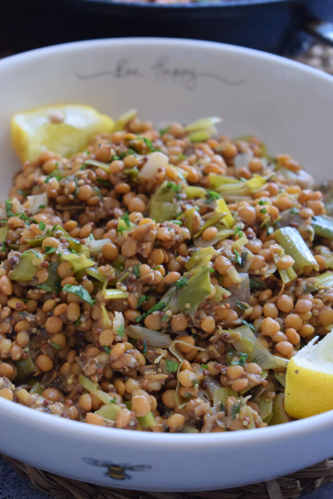 Herb butter lentils in a bowl.
