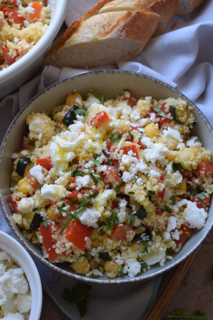 Close up of a feta and couscous salad.
