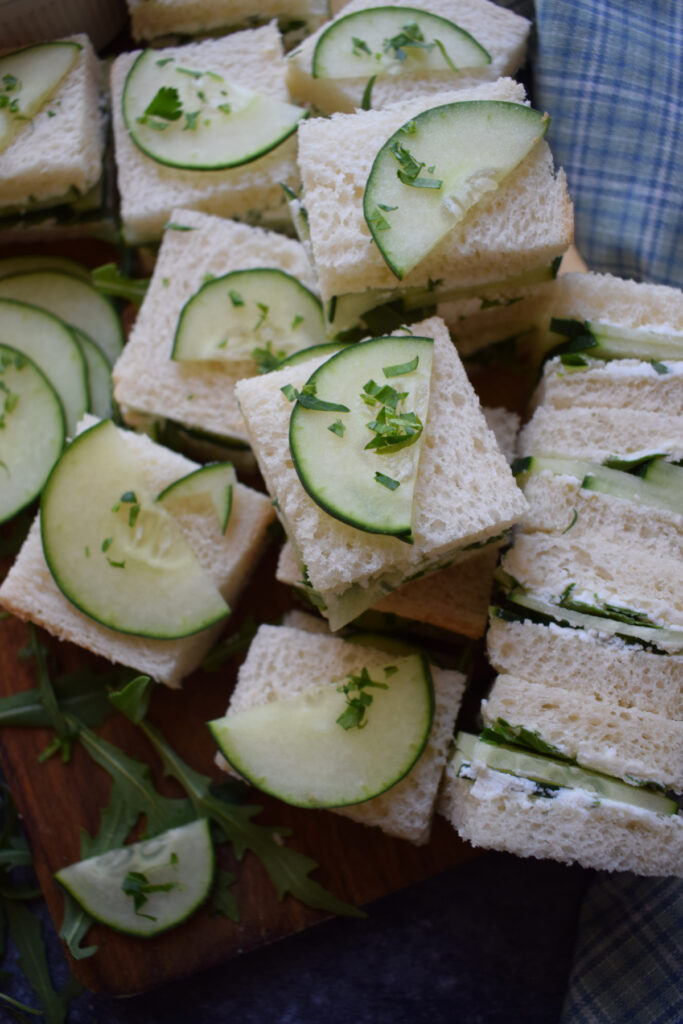 Cucumber sandwiches cut into small squares.