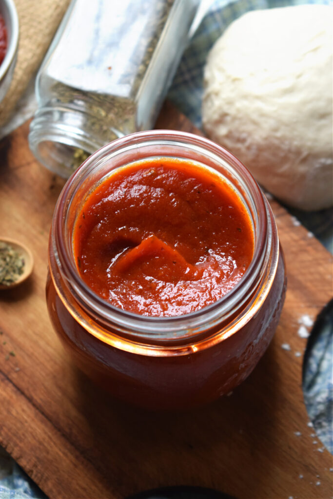 Homemade pizza sauce in a jar.