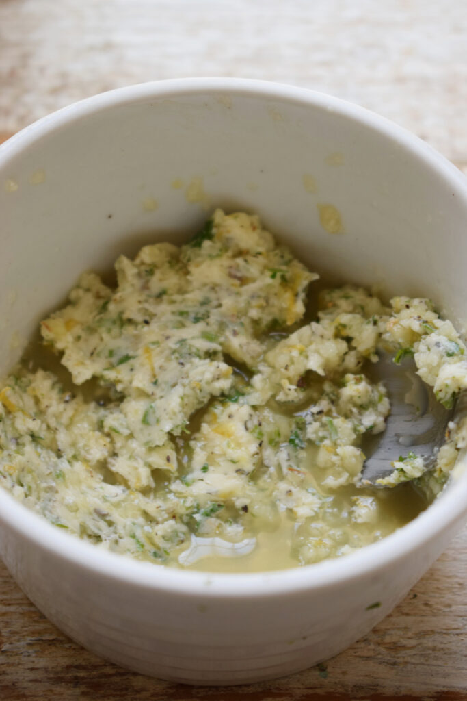 Lemon herb butter in a bowl.