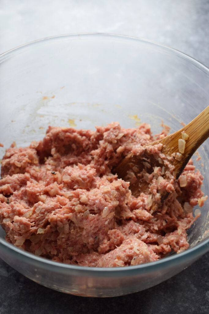 Meatball mixture in a bowl.
