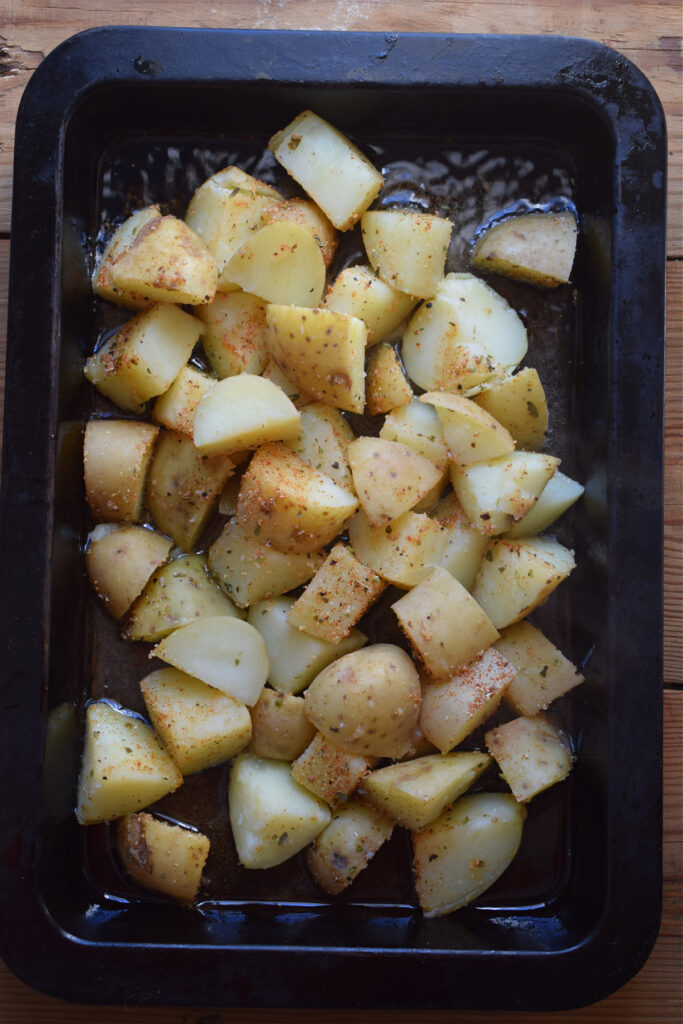 Potatoes on a baking tray.