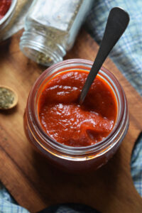 Pizza sauce in a jar.