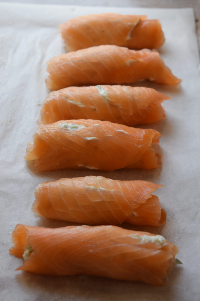 Close up of smoked smoked salmon rolls.