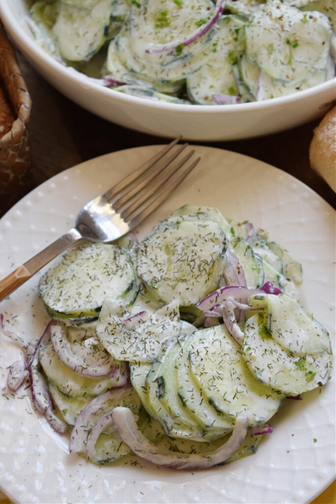 Cucumber and dill salad on a plate.
