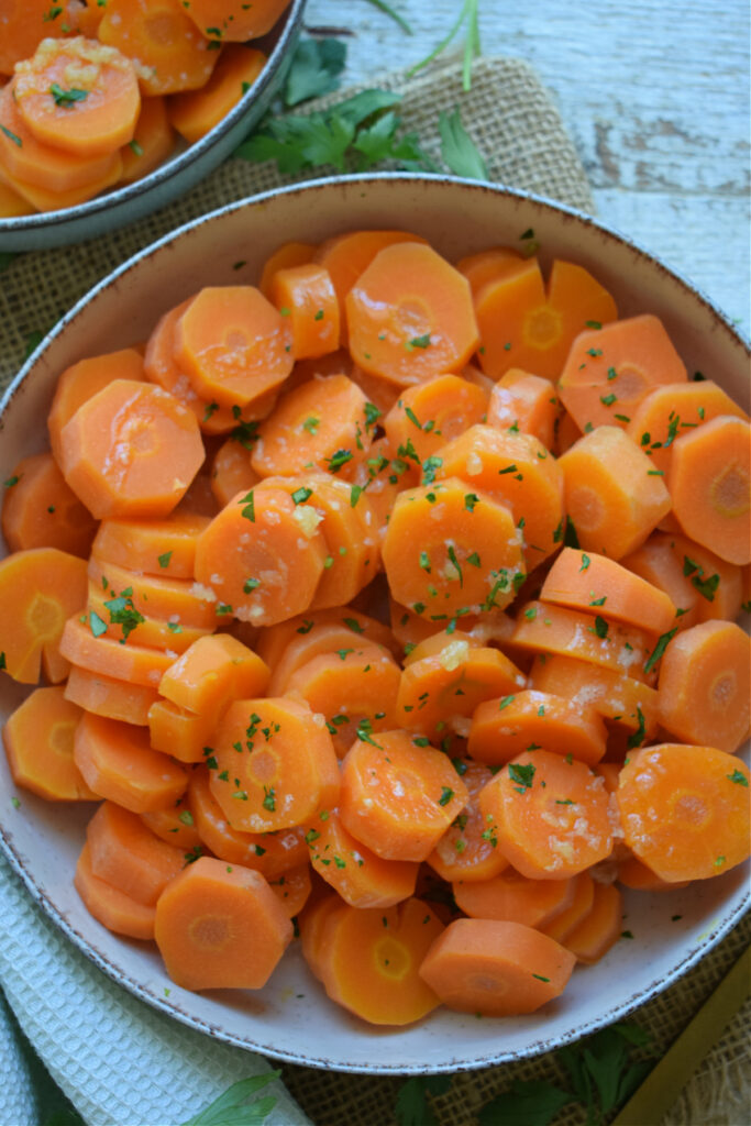 Honey garlic butter carrots in a bowl.