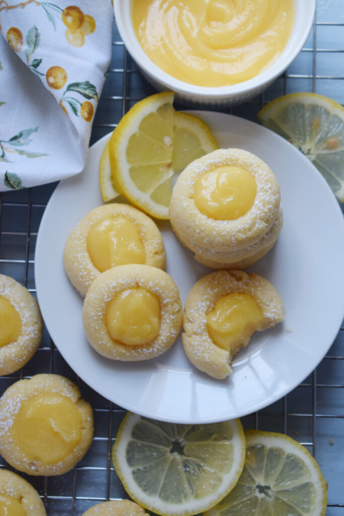 Lemon curd cookies on a plate.
