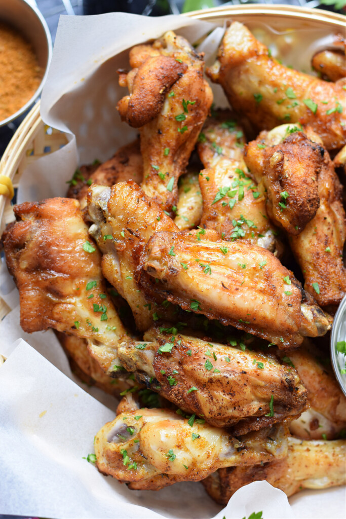 Close up of wings in a basket.
