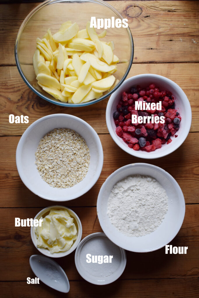 Ingredients to make apple and berry crisp.