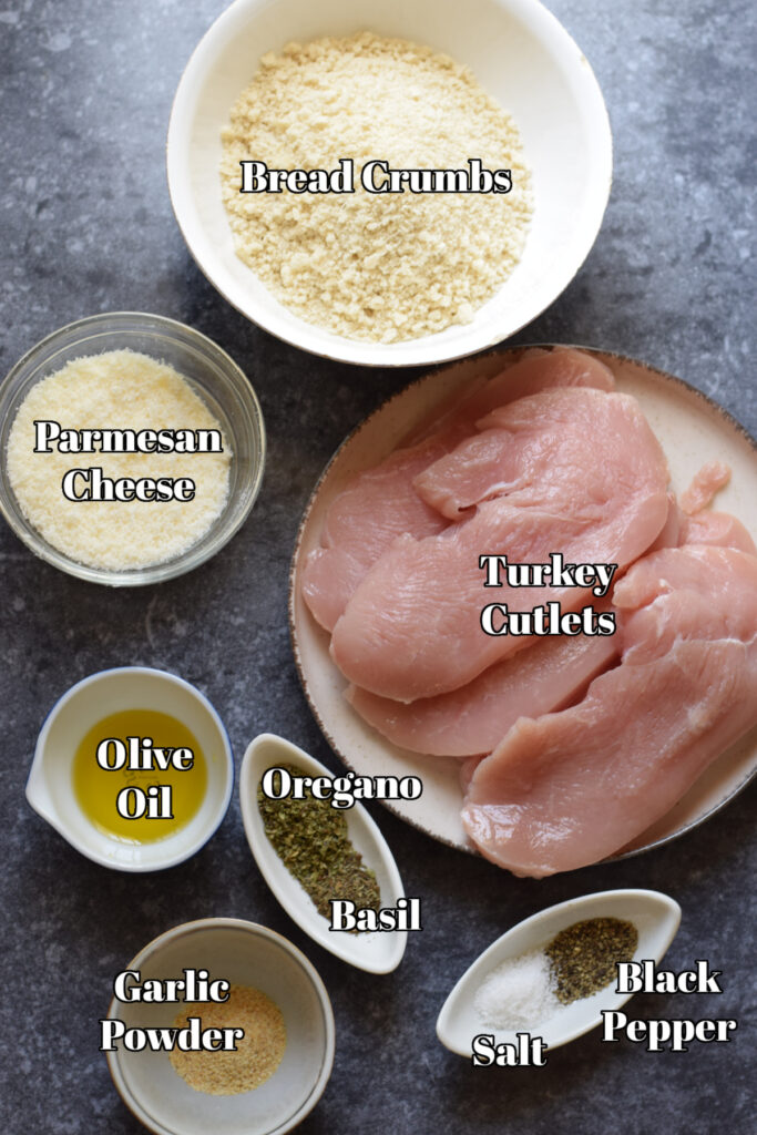 Ingredients to make parmesan turkey cutlets.