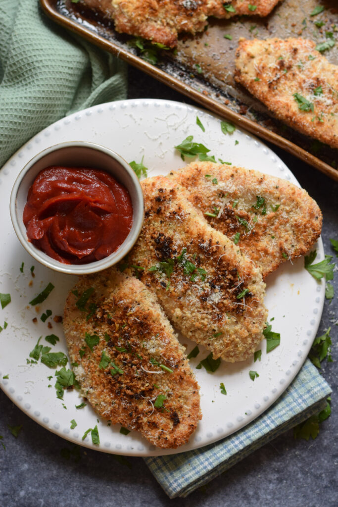 Turkey cutlets with parmesan cheese.