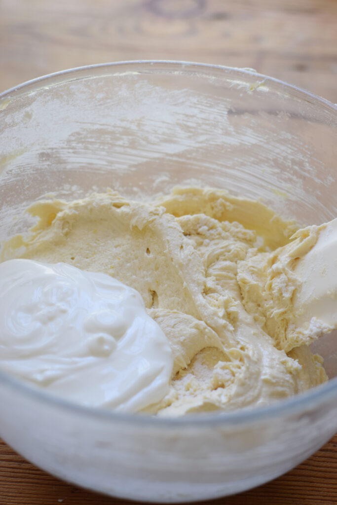 Add sour cream to cake batter.