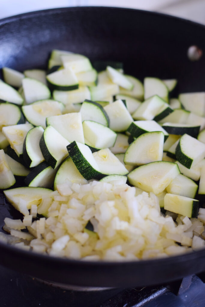 Cooking zucchini and celery.