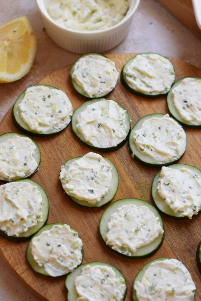 Cucumber slices topped with cream cheese.