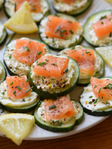 Close up of smoked salmon and cucumber bites.