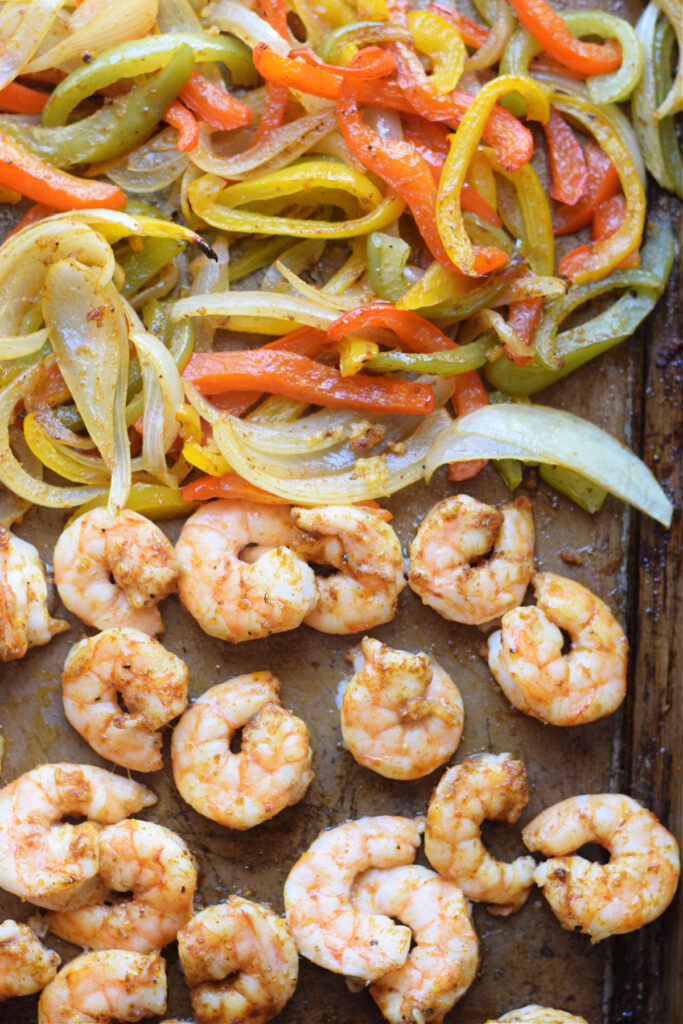 Shrimp and peppers on a tray.